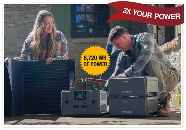 Couple outdoors with generator and expansion packs